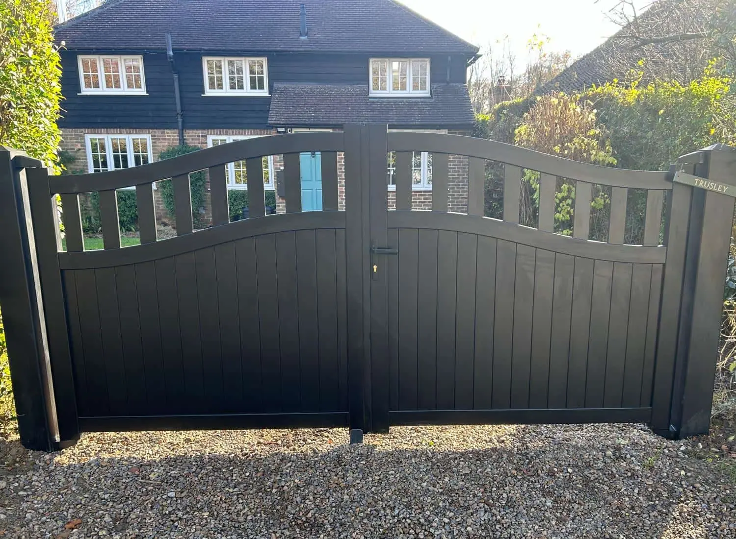 Automated wooden driveway gates with Roger Technology automation motors installed by Gate Safe registered installers in Sussex